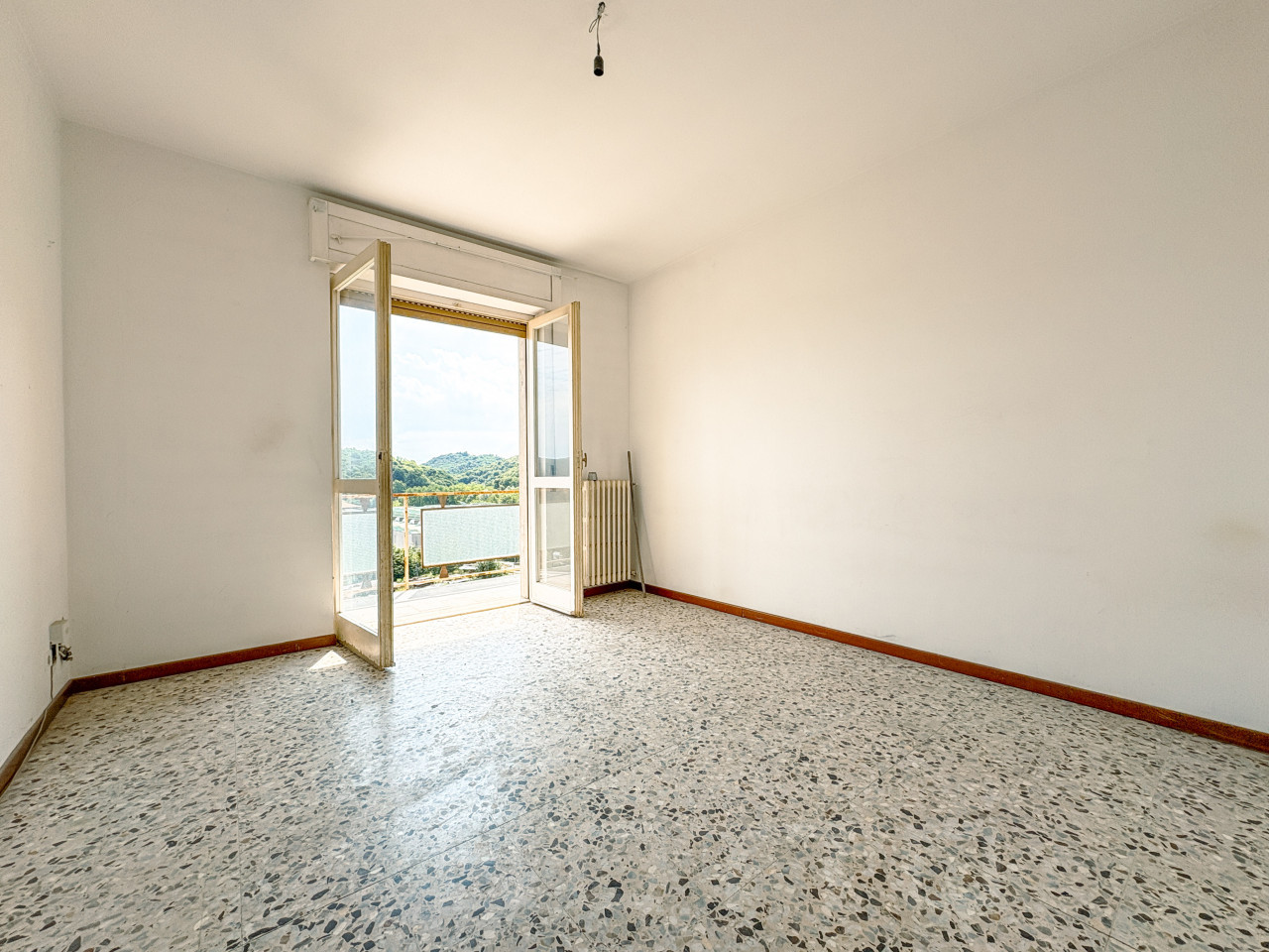 001__appartamento-vendita-pogno-stanza_wmk_0
