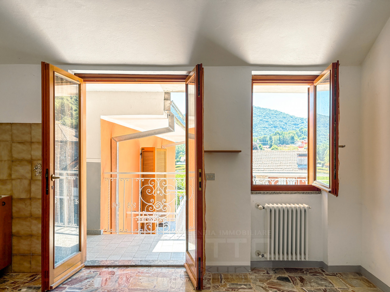 002__appartamento-vendita-brovello-balcone4_wmk_0