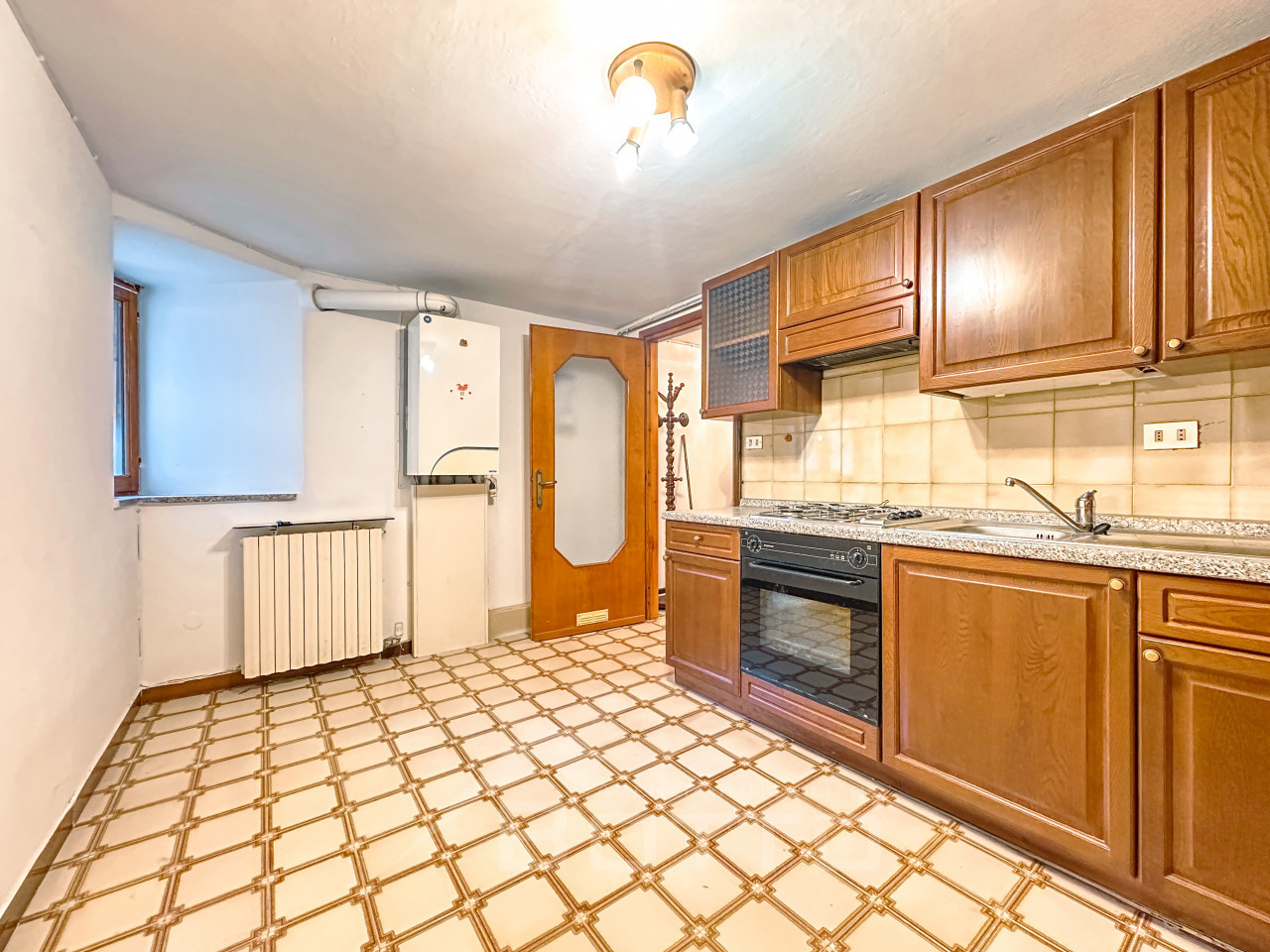 003__vendita-casa-serravallesesia-cucina3_wmk_0