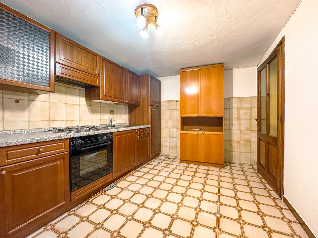 004__vendita-casa-serravallesesia-cucina1_wmk_0